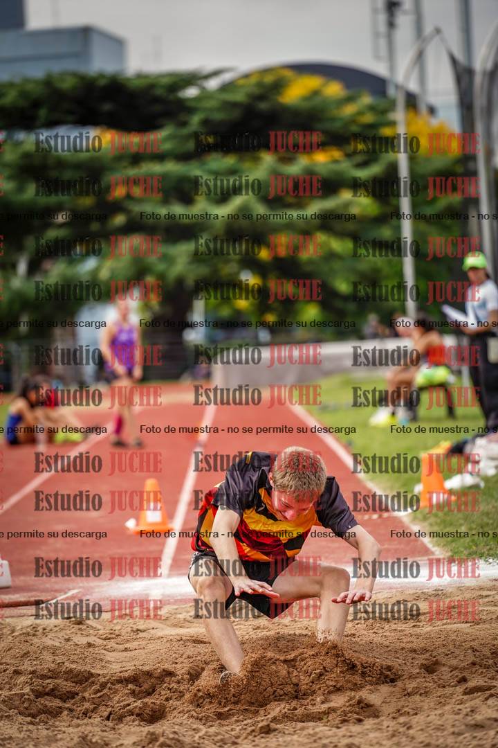 Fotos del salto triple de mujeres y varones
