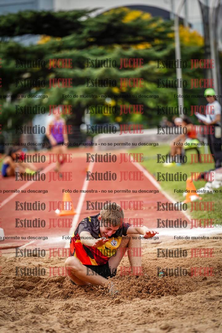 Fotos del salto triple de mujeres y varones