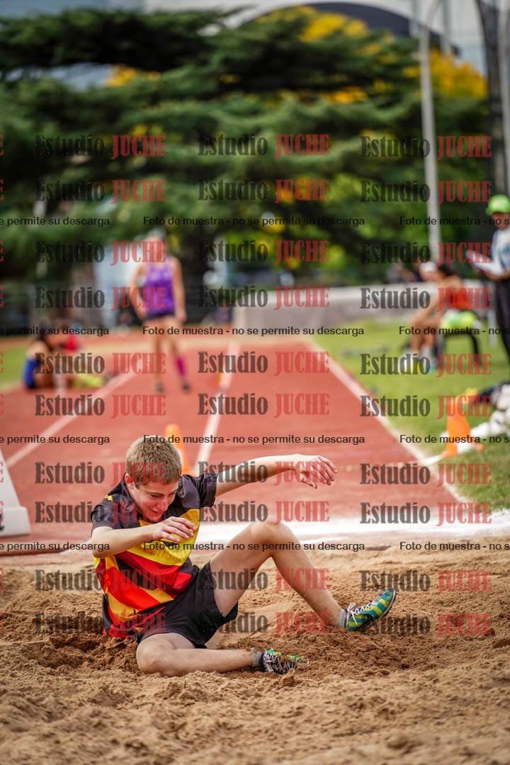 Fotos del salto triple de mujeres y varones