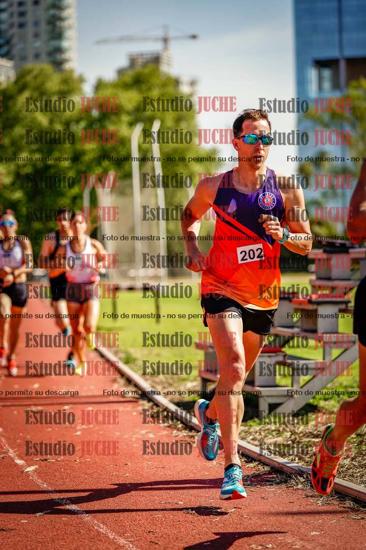 Fotos de los 5000 m llanos de mujeres y varones