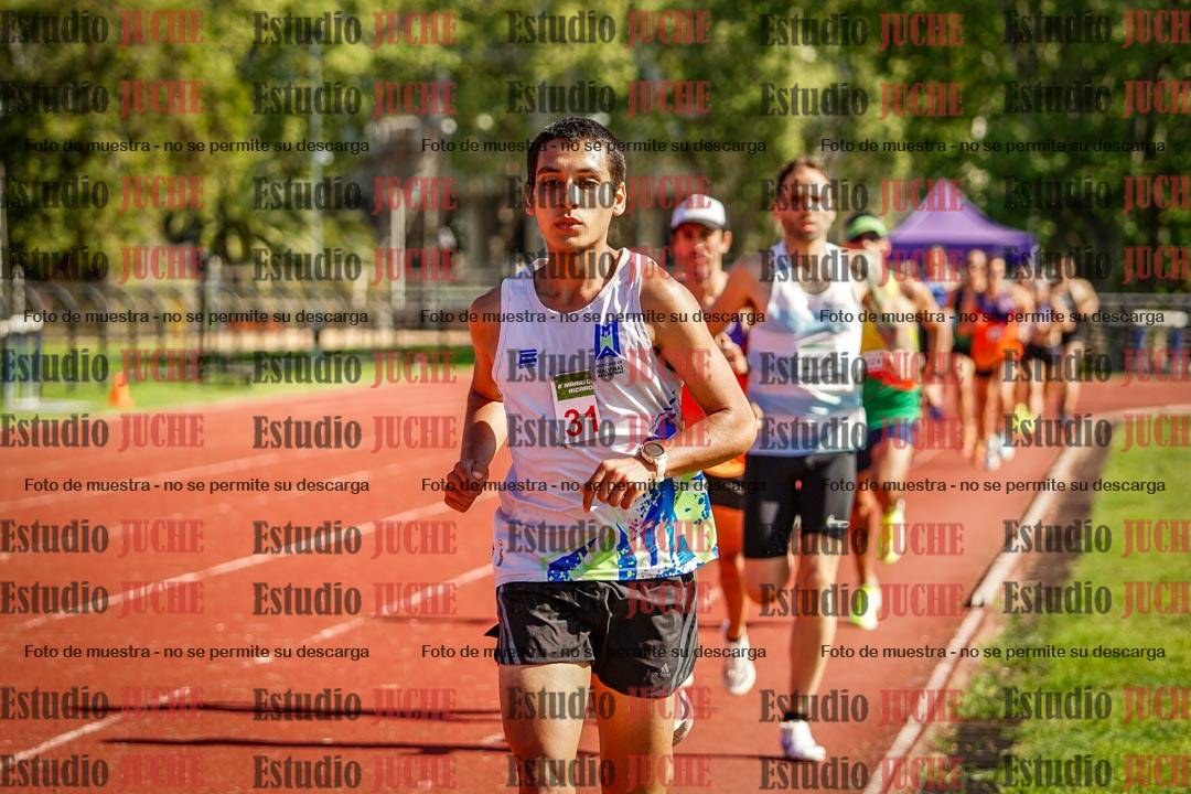 Fotos de los 5000 m llanos de mujeres y varones