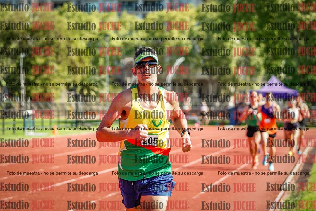 Fotos de los 5000 m llanos de mujeres y varones