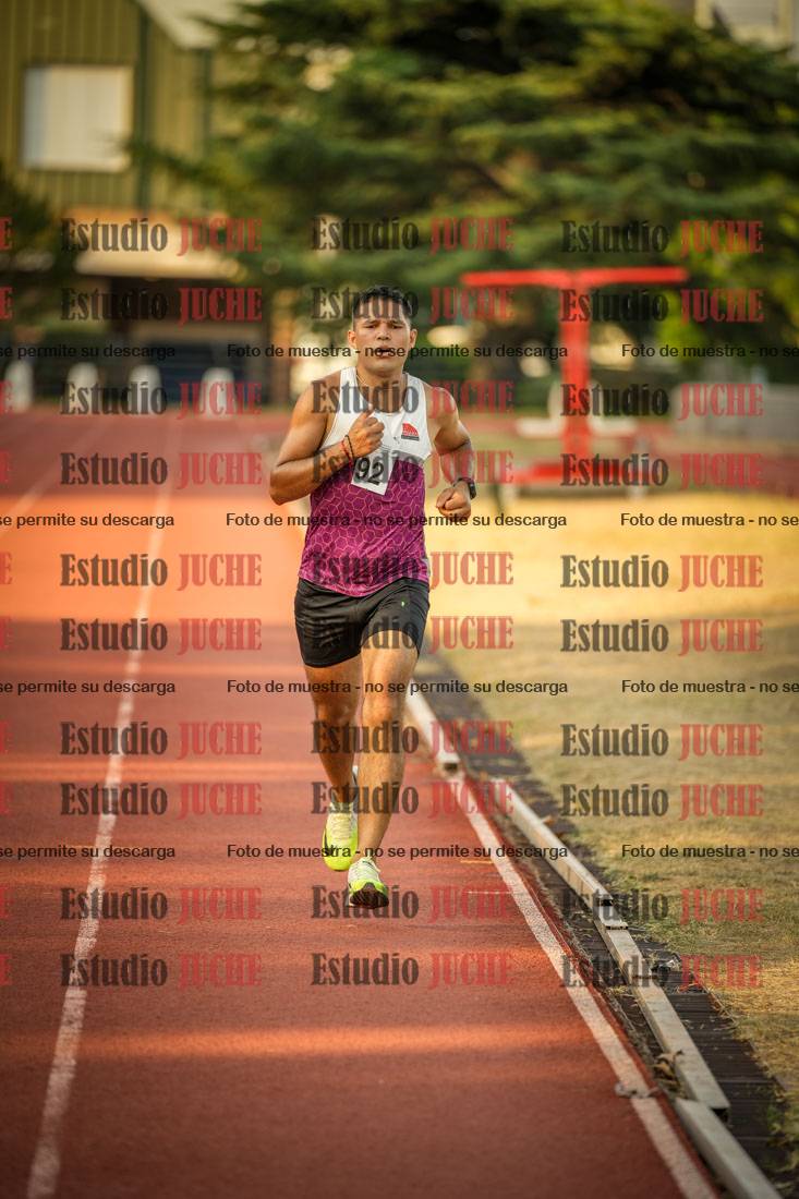 Fotos de los 5000 m llanos de mujeres y varones
