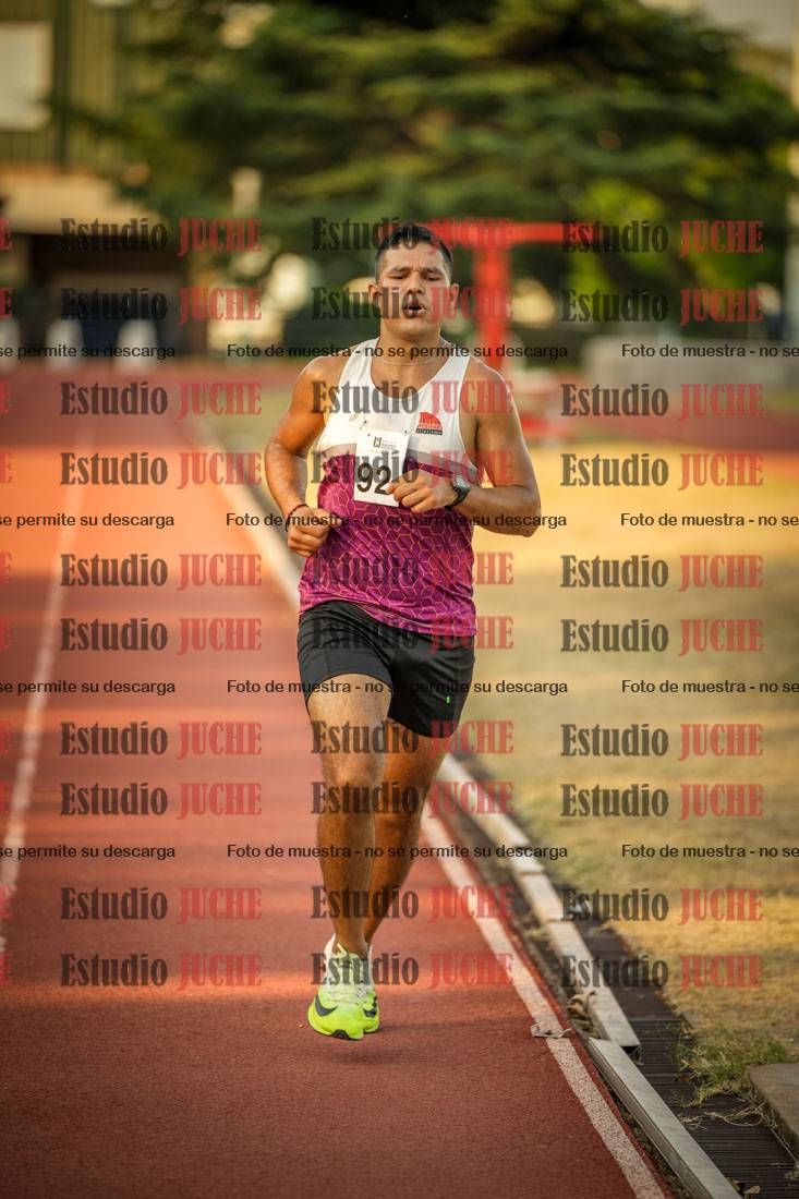Fotos de los 5000 m llanos de mujeres y varones