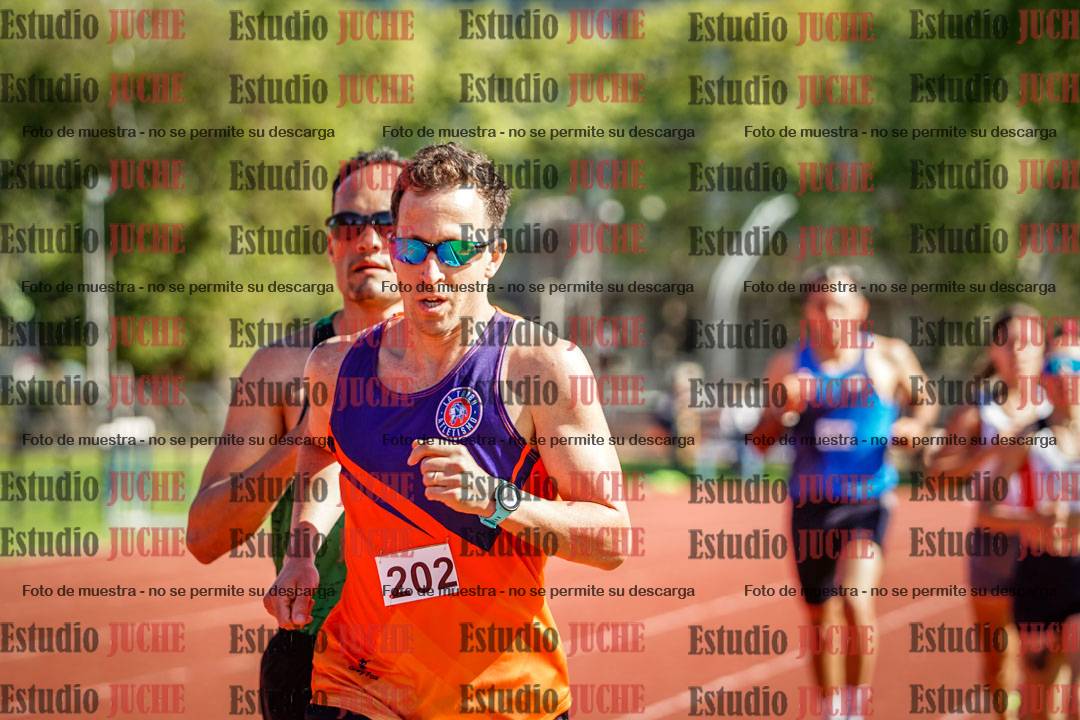 Fotos de los 5000 m llanos de mujeres y varones