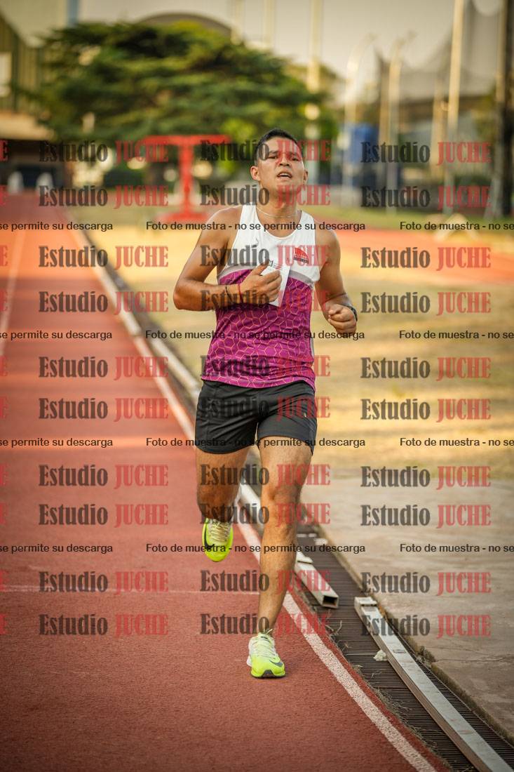 Fotos de los 5000 m llanos de mujeres y varones