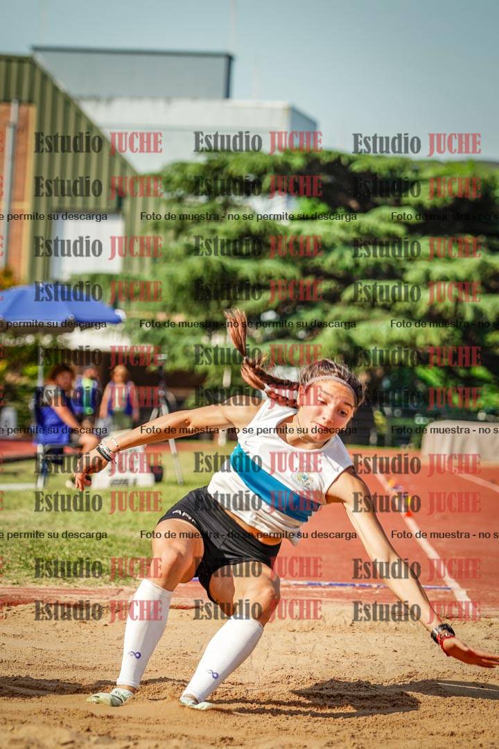Fotos del salto en largo de mujeres