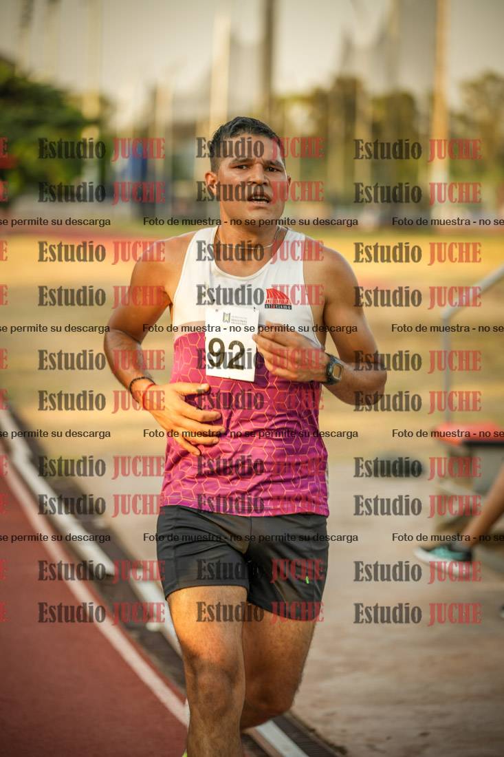 Fotos de los 5000 m llanos de mujeres y varones