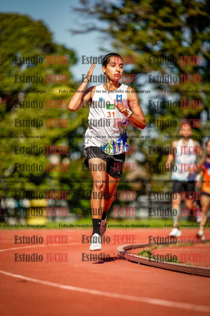 Fotos de los 5000 m llanos de mujeres y varones