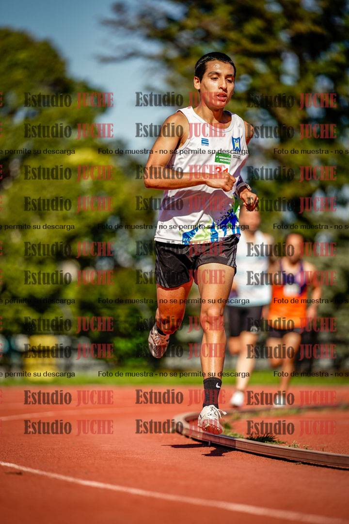 Fotos de los 5000 m llanos de mujeres y varones