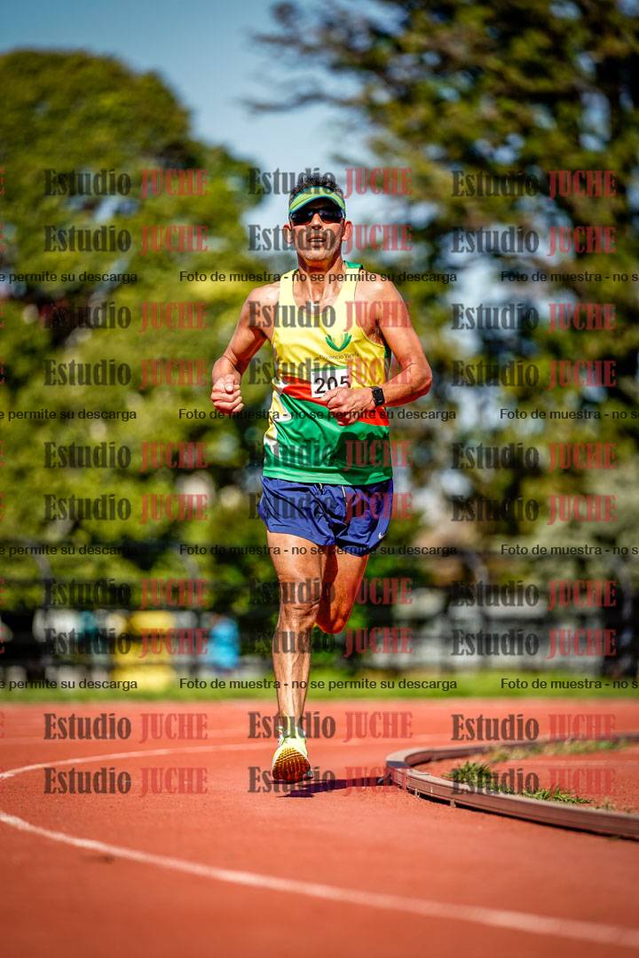 Fotos de los 5000 m llanos de mujeres y varones