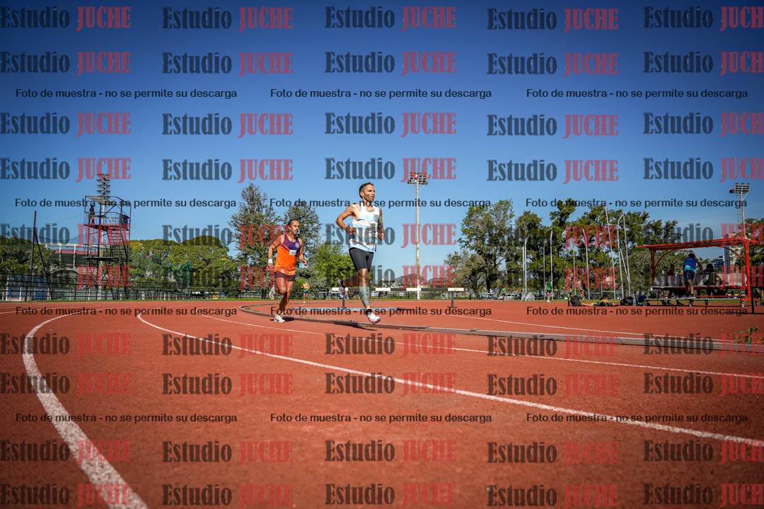 Fotos de los 5000 m llanos de mujeres y varones