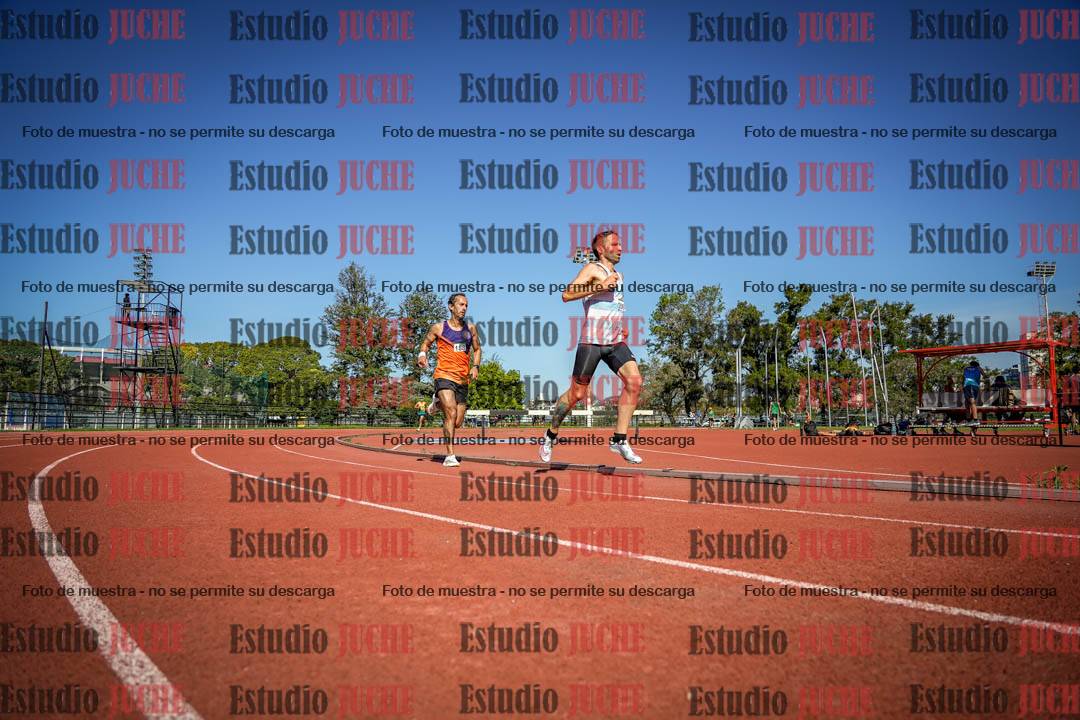 Fotos de los 5000 m llanos de mujeres y varones