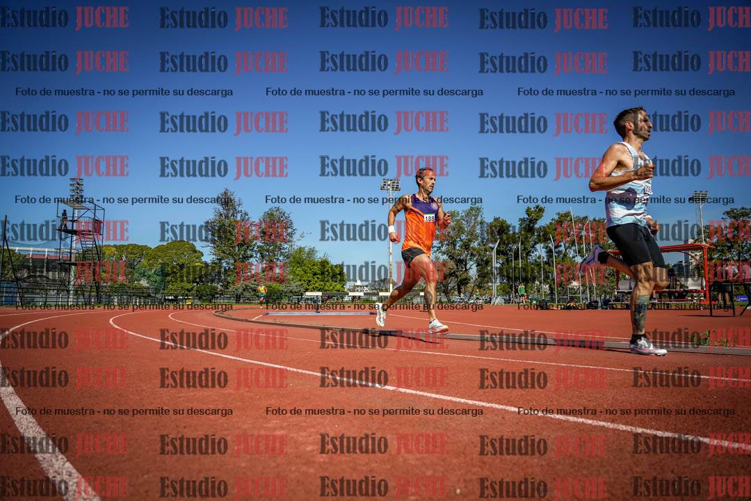 Fotos de los 5000 m llanos de mujeres y varones