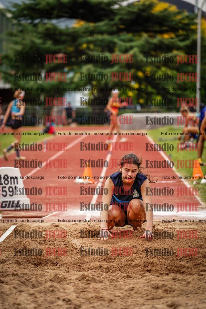 Fotos del salto triple de mujeres y varones