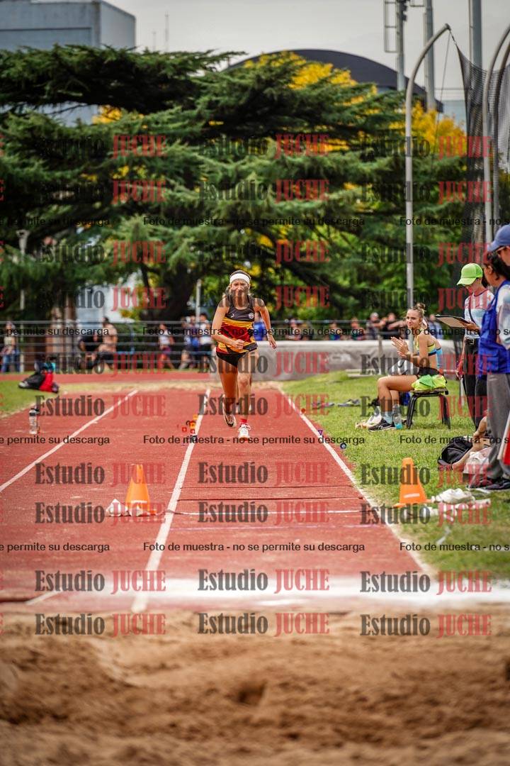 Fotos del salto triple de mujeres y varones