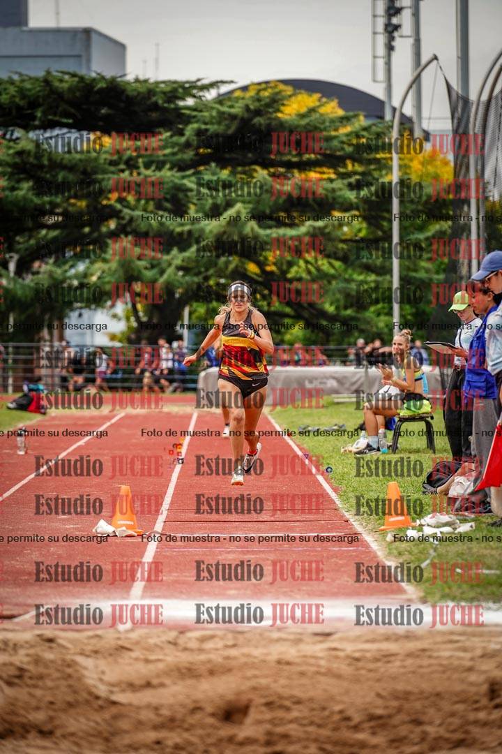 Fotos del salto triple de mujeres y varones