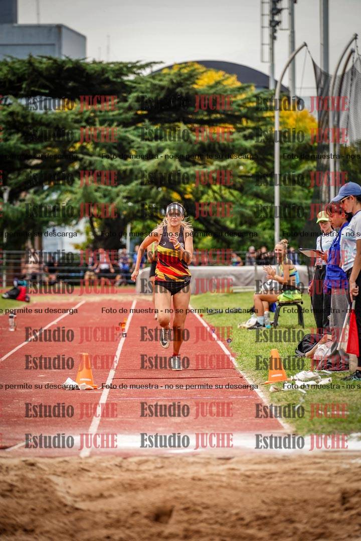 Fotos del salto triple de mujeres y varones