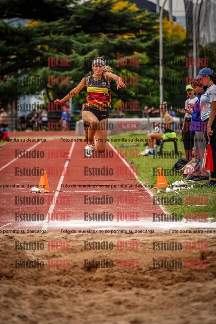 Fotos del salto triple de mujeres y varones