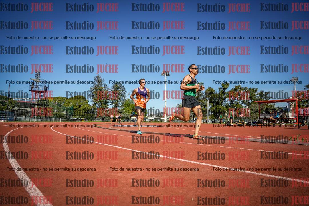 Fotos de los 5000 m llanos de mujeres y varones