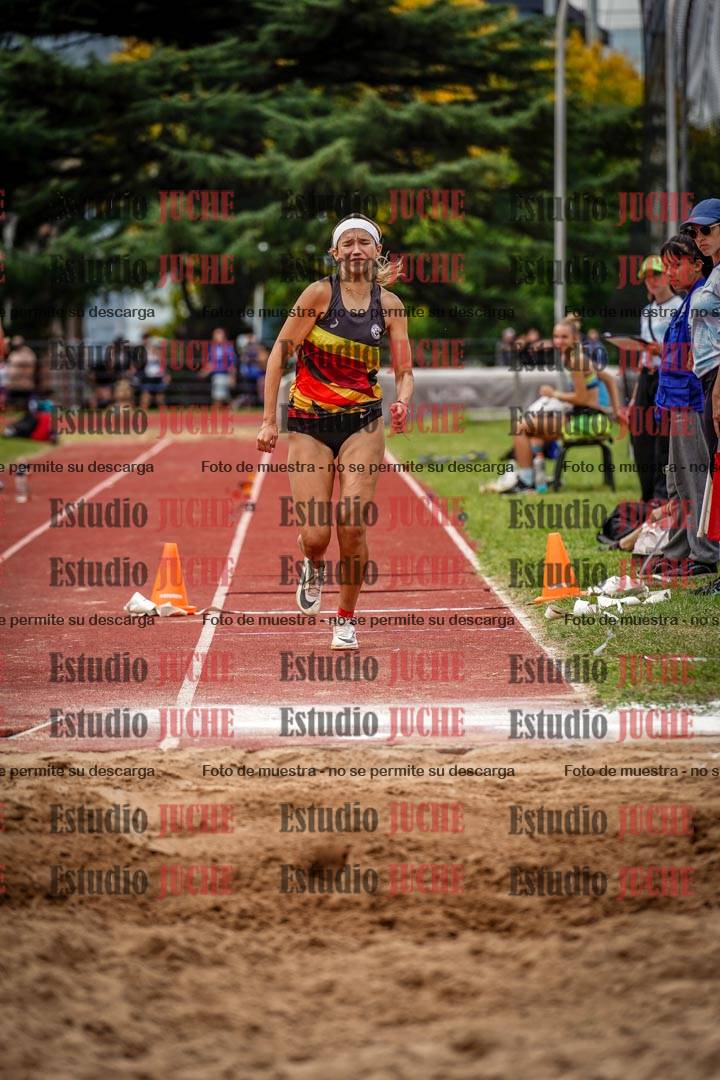 Fotos del salto triple de mujeres y varones