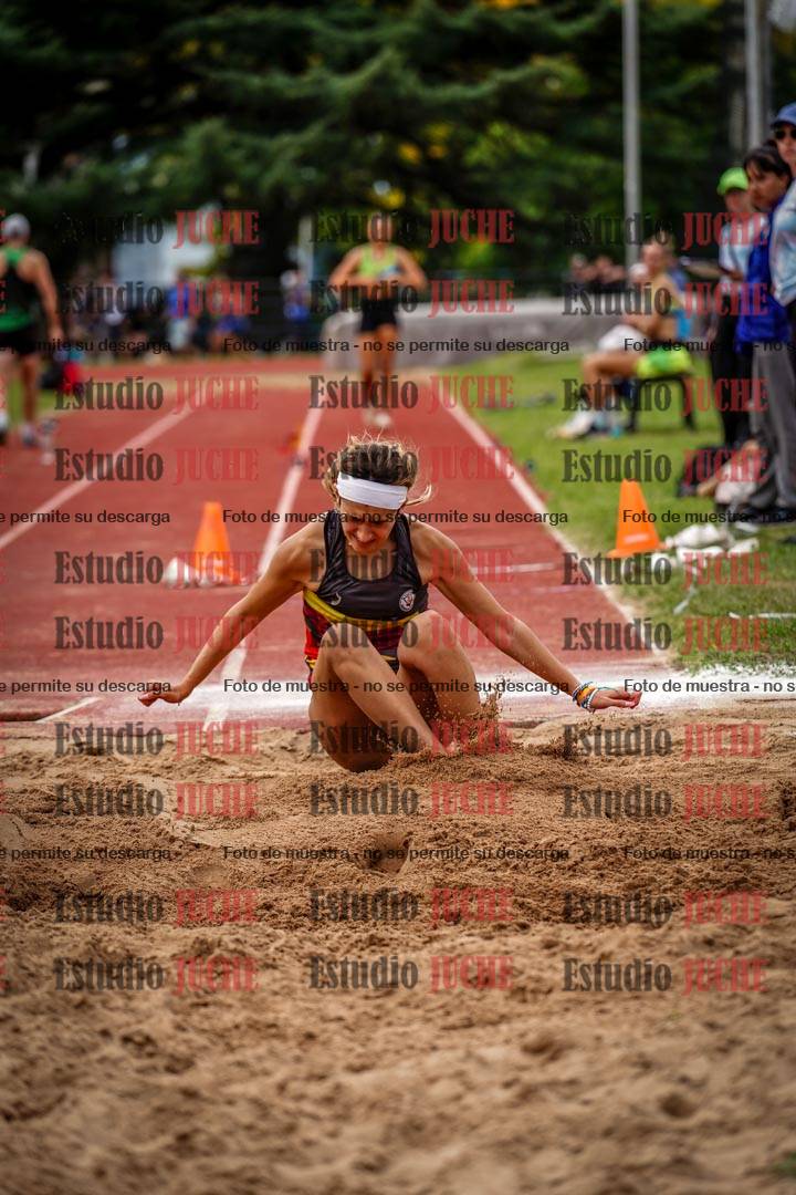 Fotos del salto triple de mujeres y varones