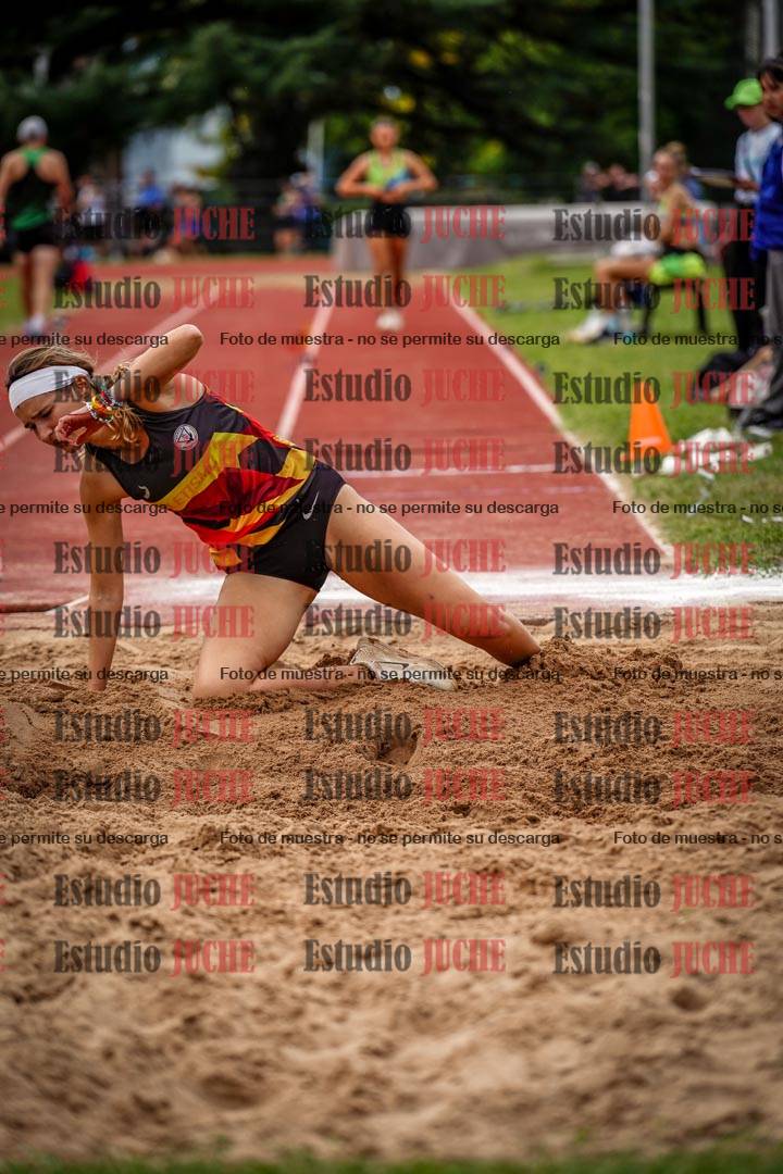 Fotos del salto triple de mujeres y varones