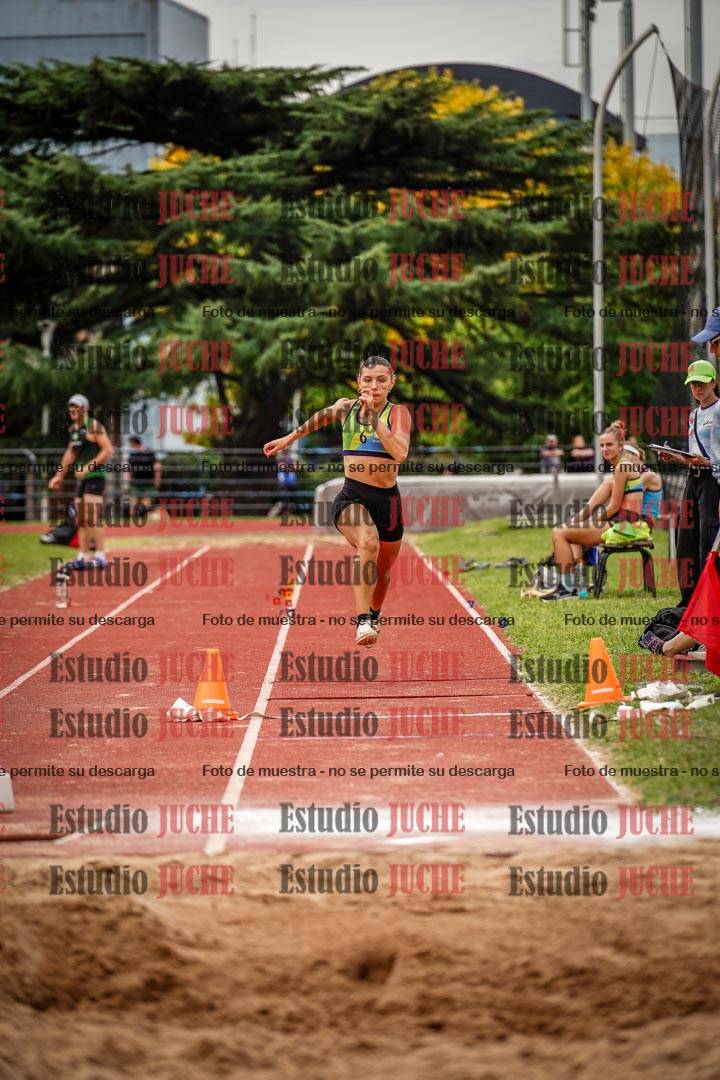 Fotos del salto triple de mujeres y varones