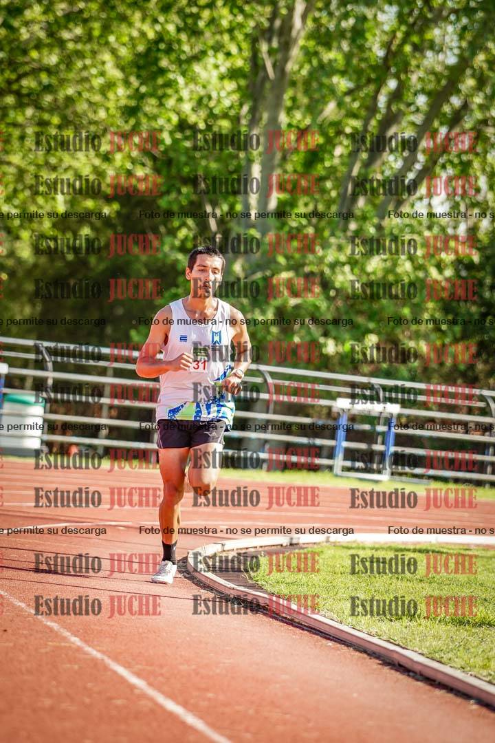 Fotos de los 5000 m llanos de mujeres y varones