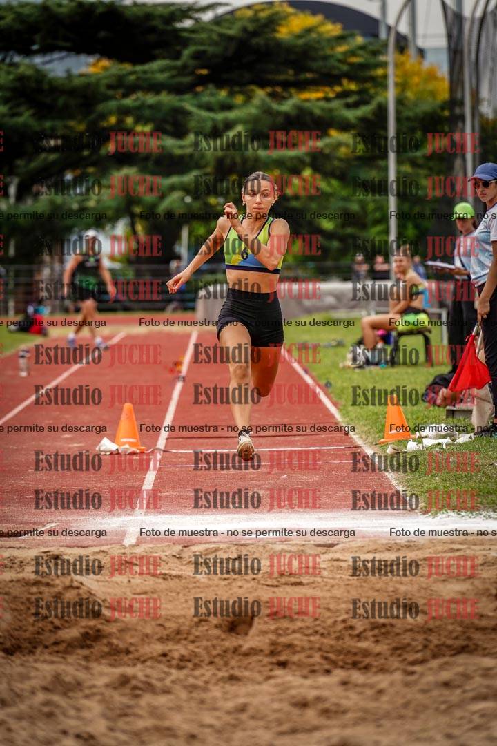 Fotos del salto triple de mujeres y varones