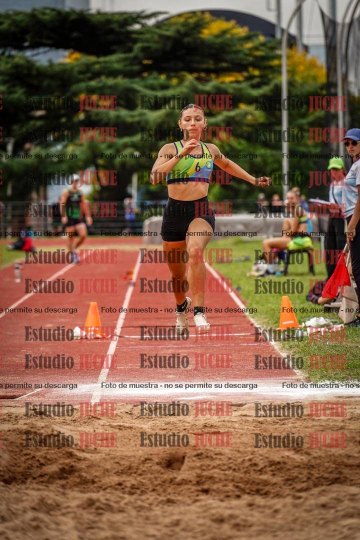 Fotos del salto triple de mujeres y varones