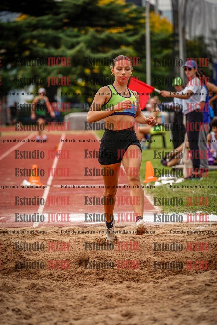 Fotos del salto triple de mujeres y varones