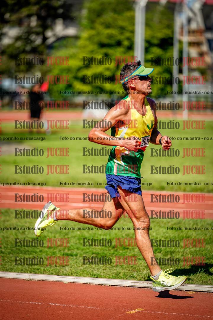 Fotos de los 5000 m llanos de mujeres y varones