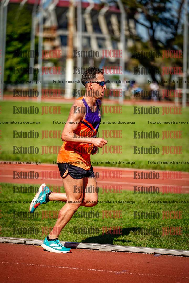 Fotos de los 5000 m llanos de mujeres y varones