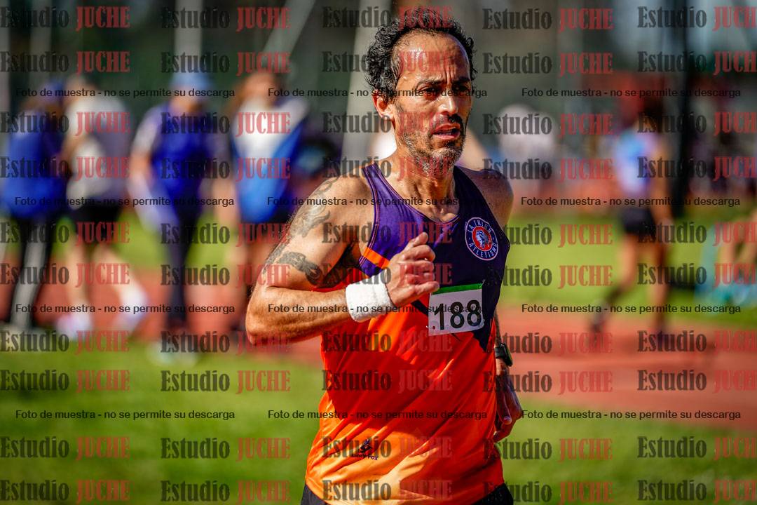 Fotos de los 5000 m llanos de mujeres y varones