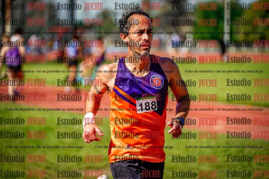 Fotos de los 5000 m llanos de mujeres y varones