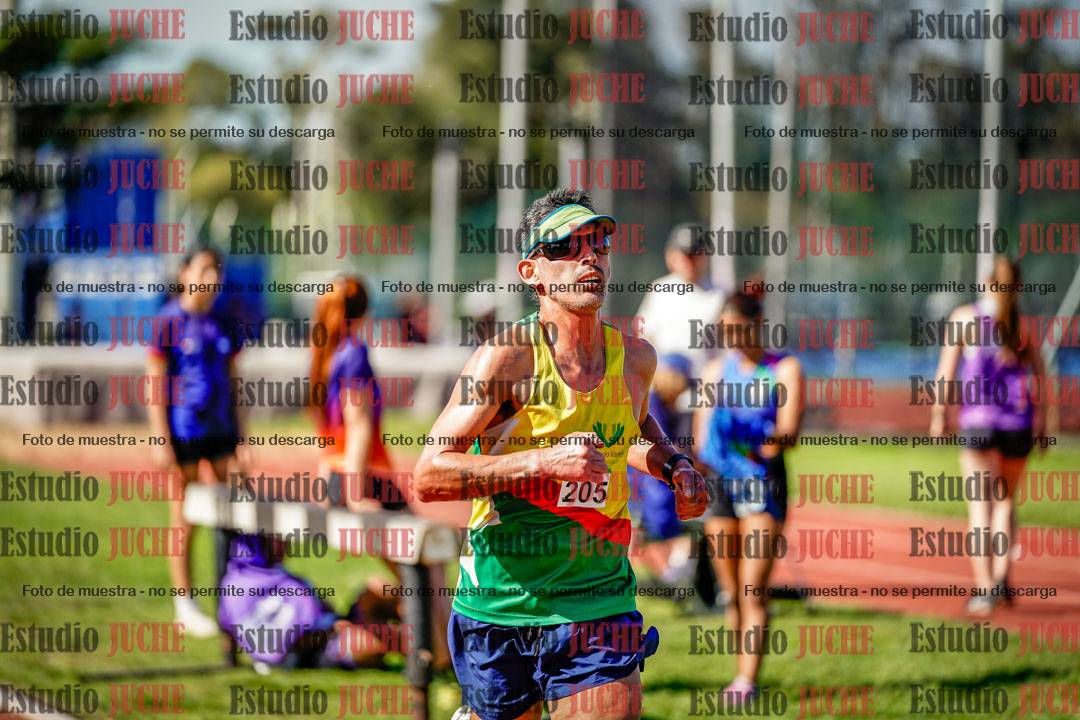 Fotos de los 5000 m llanos de mujeres y varones