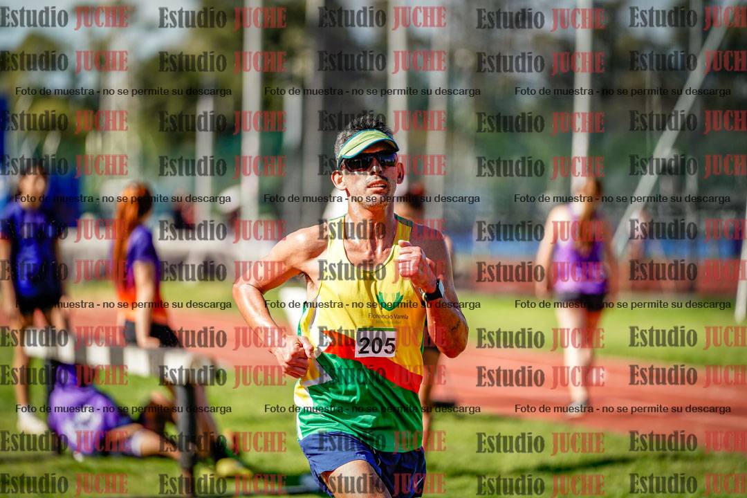 Fotos de los 5000 m llanos de mujeres y varones