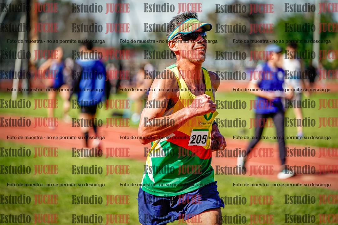 Fotos de los 5000 m llanos de mujeres y varones