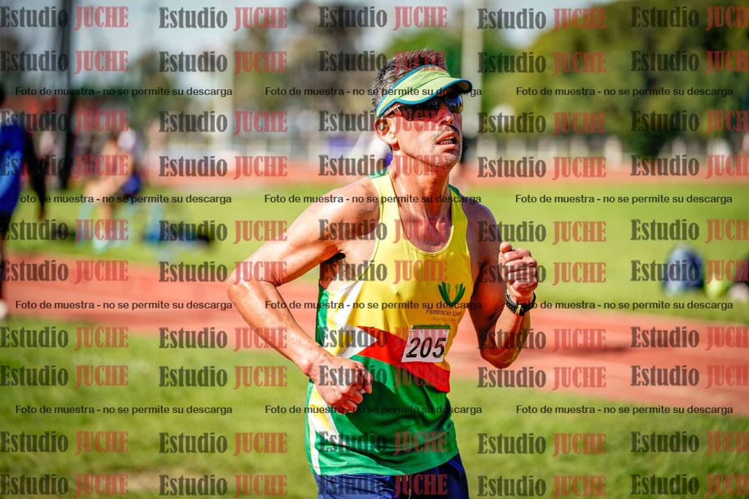 Fotos de los 5000 m llanos de mujeres y varones