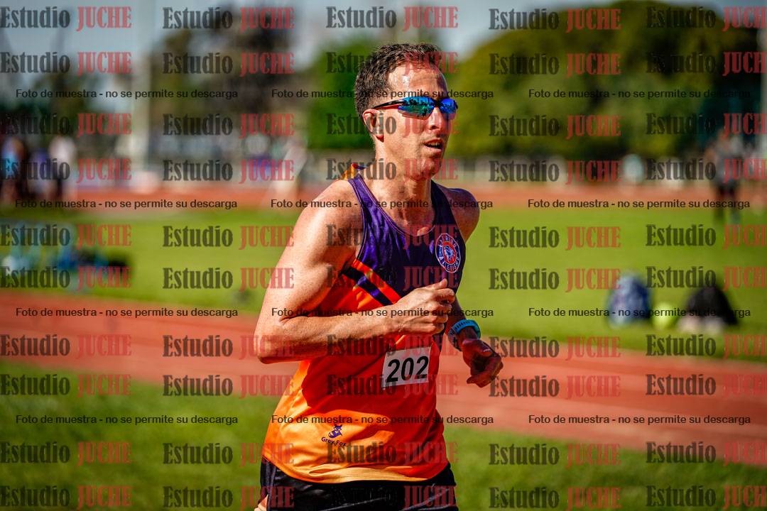 Fotos de los 5000 m llanos de mujeres y varones