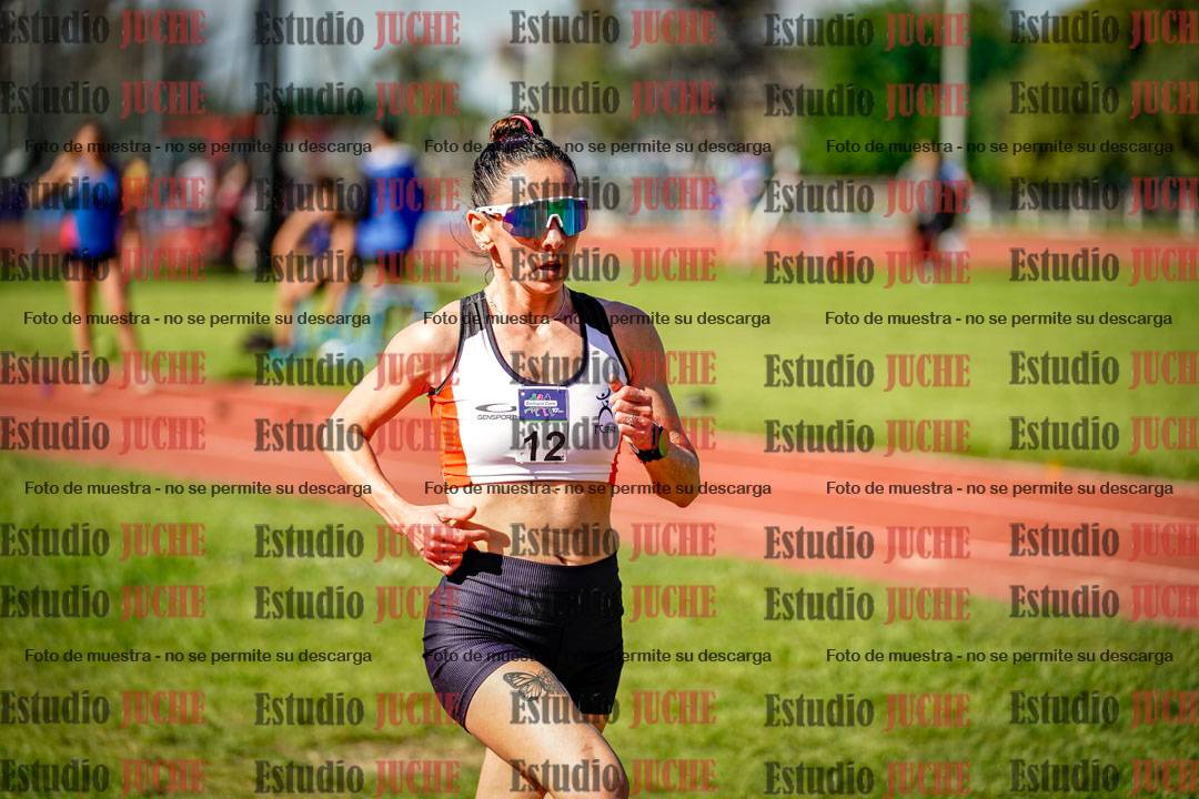 Fotos de los 5000 m llanos de mujeres y varones