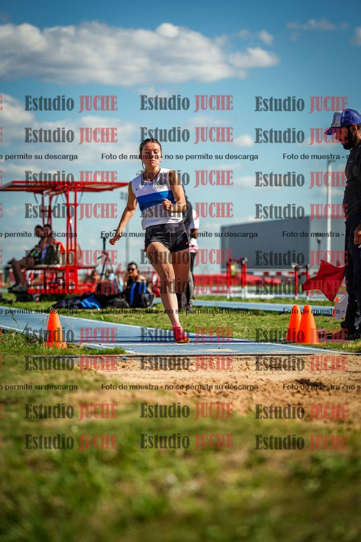 Fotos del salto en largo de mujeres - invitados