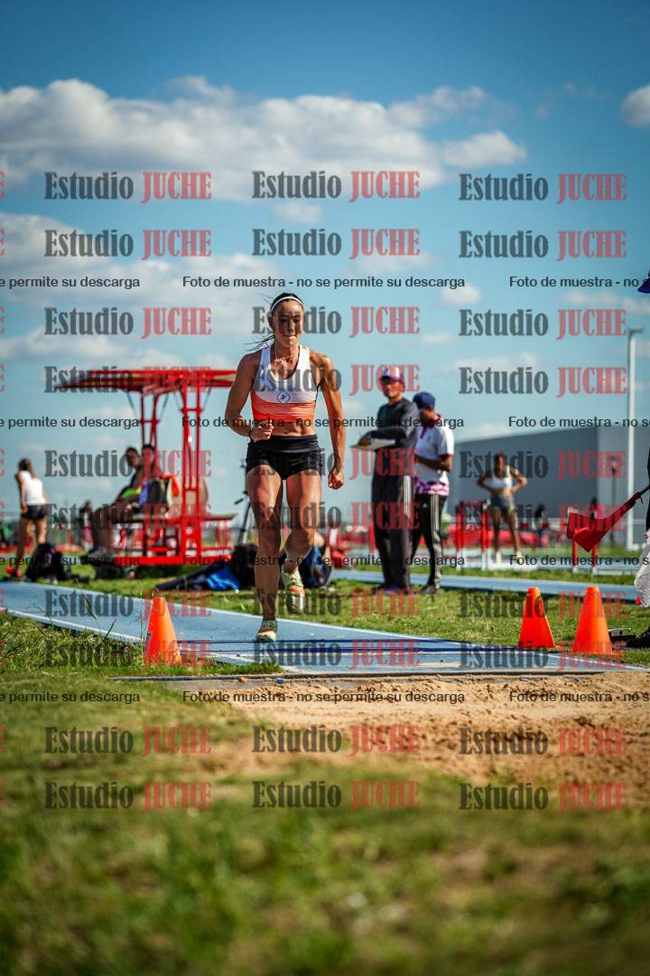 Fotos del salto en largo de mujeres - invitados