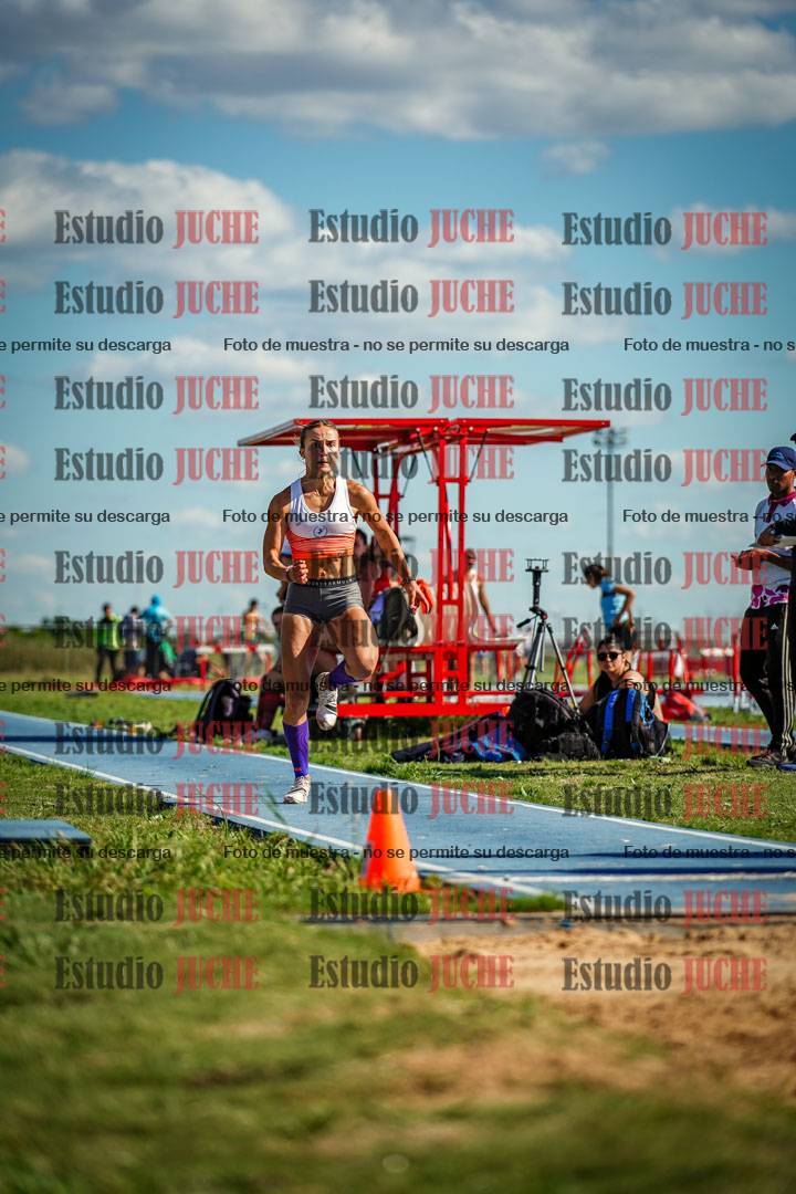 Fotos del salto en largo de mujeres - invitados
