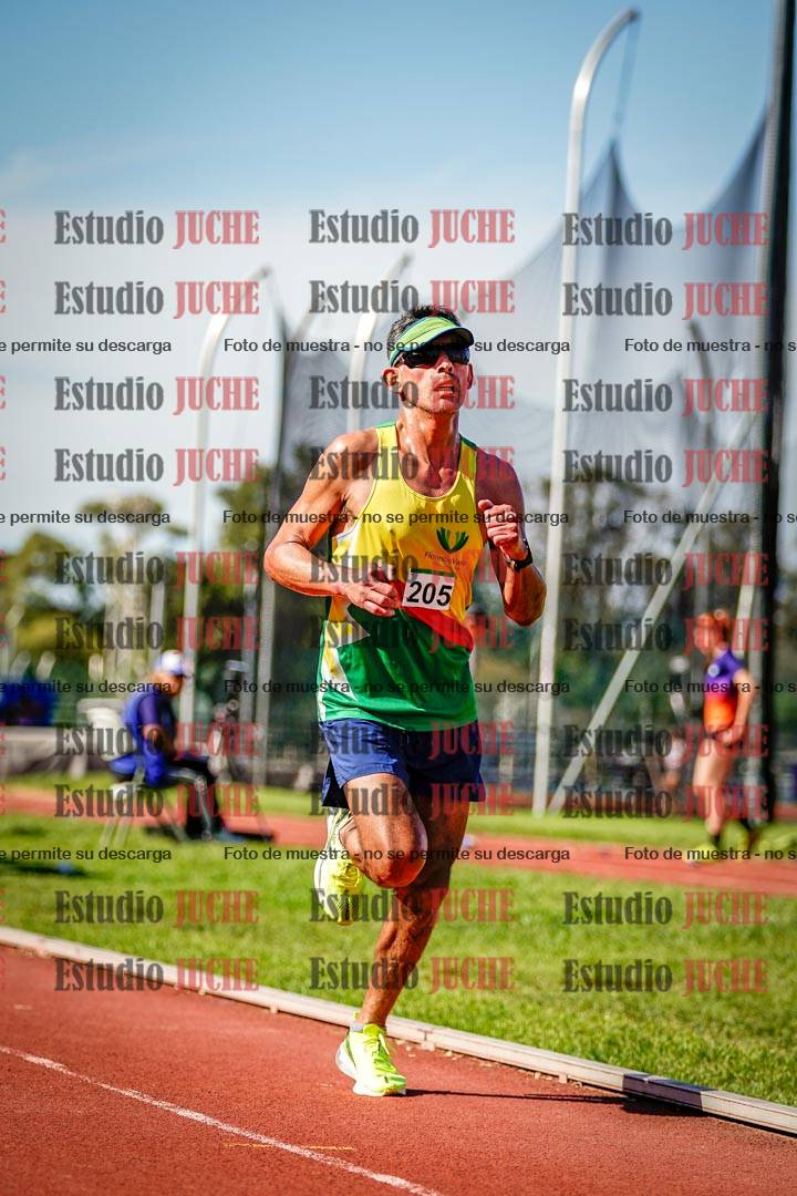 Fotos de los 5000 m llanos de mujeres y varones