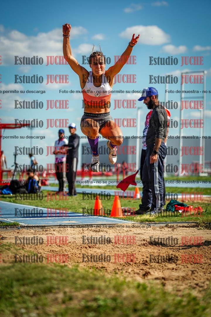 Fotos del salto en largo de mujeres - invitados