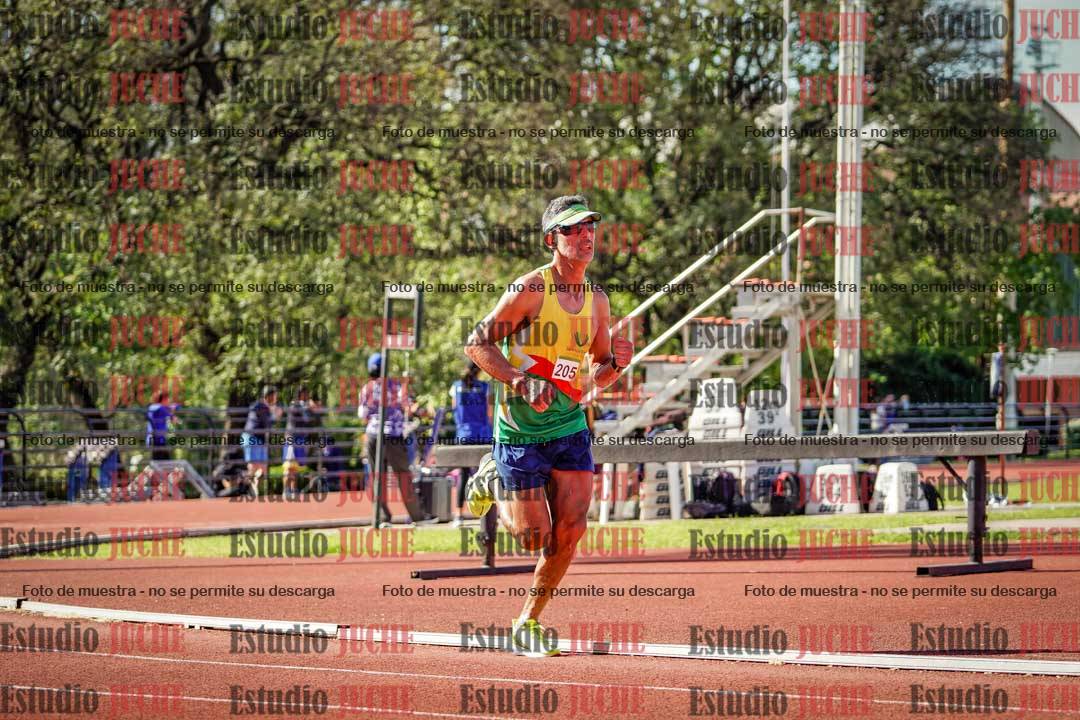 Fotos de los 5000 m llanos de mujeres y varones