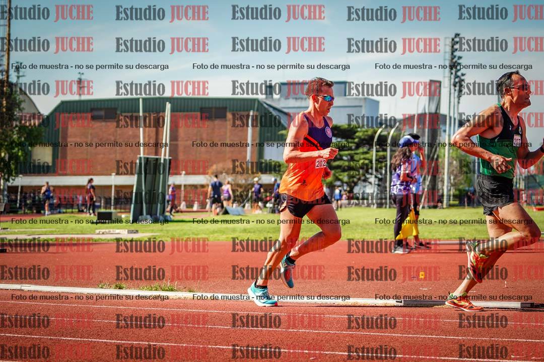 Fotos de los 5000 m llanos de mujeres y varones