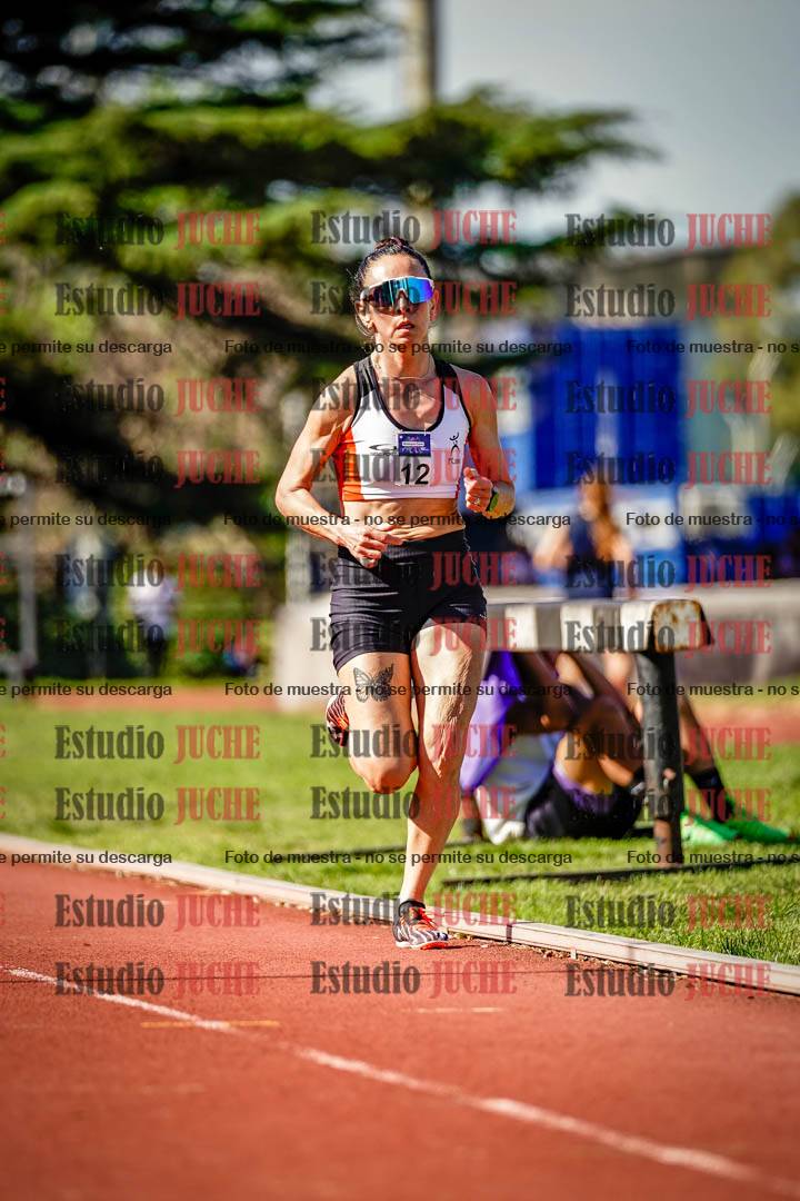 Fotos de los 5000 m llanos de mujeres y varones